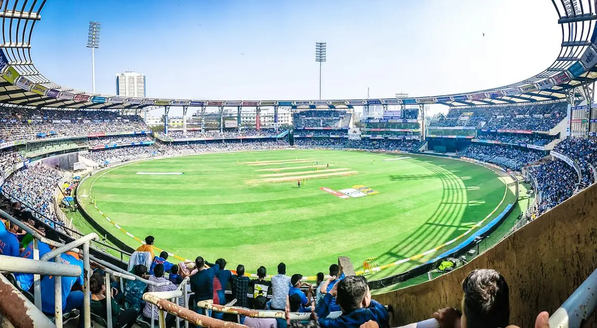 Cricket field and boundary seen from a spectator stand