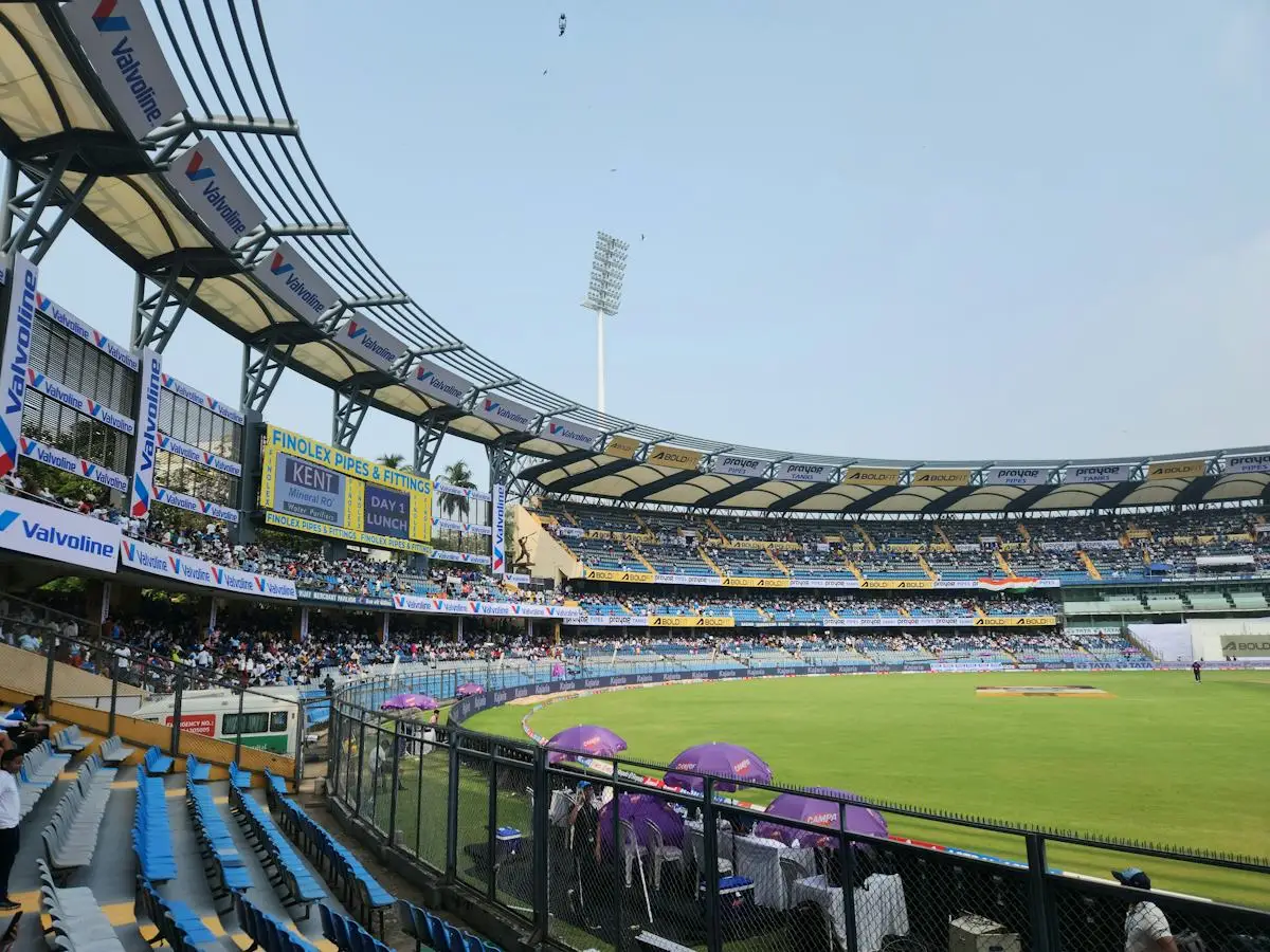 Modern cricket ground with covered stands